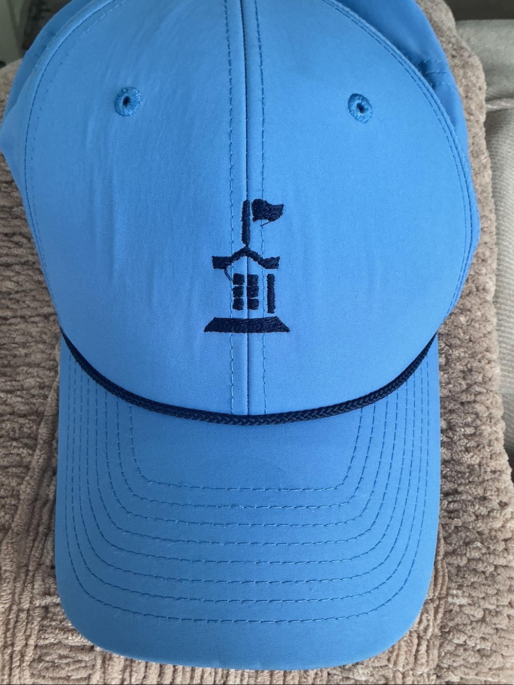 Mens Light Blue golf Cap with Navy Trim and Embroidered Crest